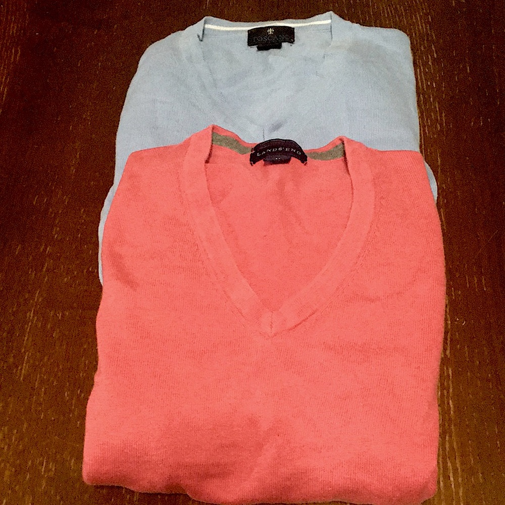 Two V neck long sleeve sweaters